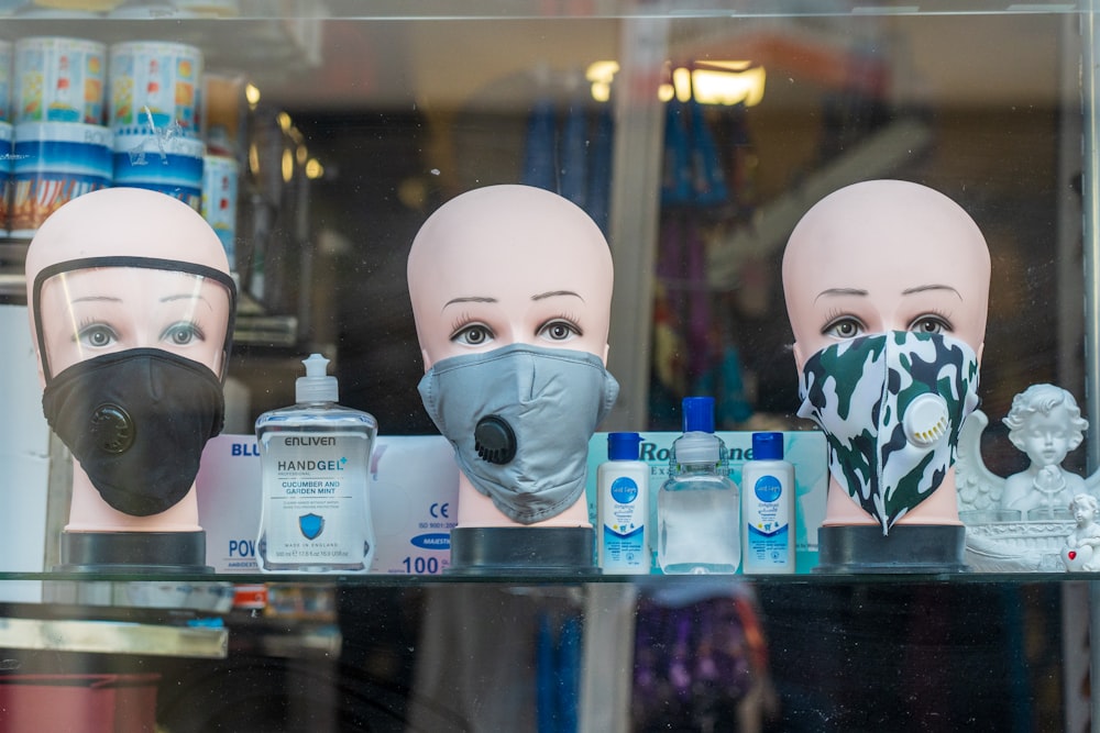 white mask on glass shelf