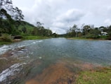 A serene landscape showing a clean river flowing.