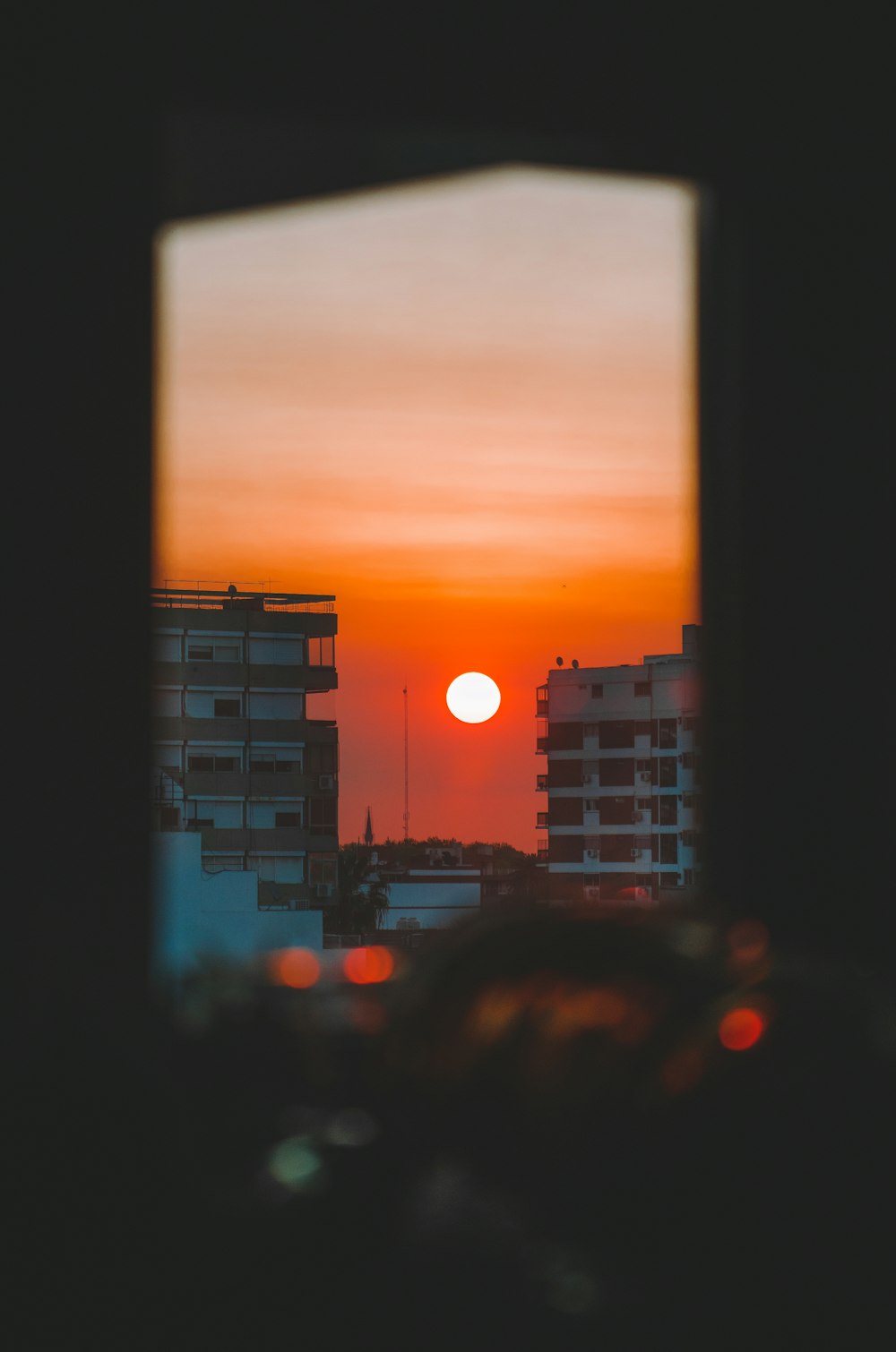 silhouette of city buildings during sunset