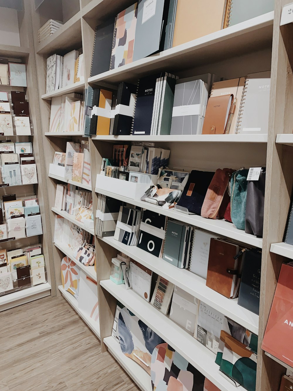 books on brown wooden shelf