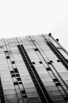 Photo showing a commercial building mid-refurbishment with workers.