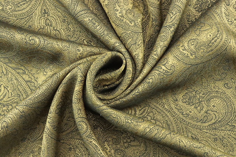 brown and gray floral textile