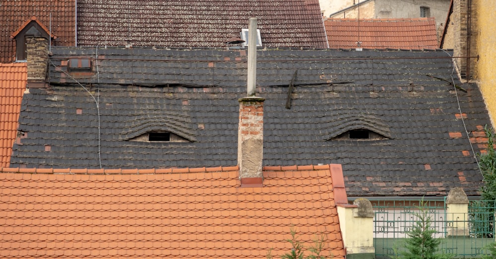 brown brick wall with white cross