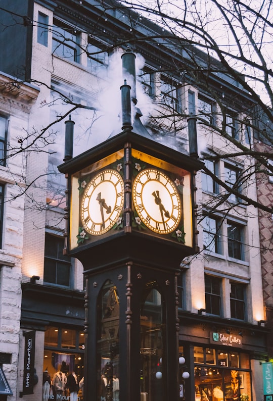 brown wooden analog clock at 10 00 in Gastown Vancouver Steam Clock Canada