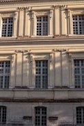 Architectural detail of a classical courthouse facade under soft natural light.