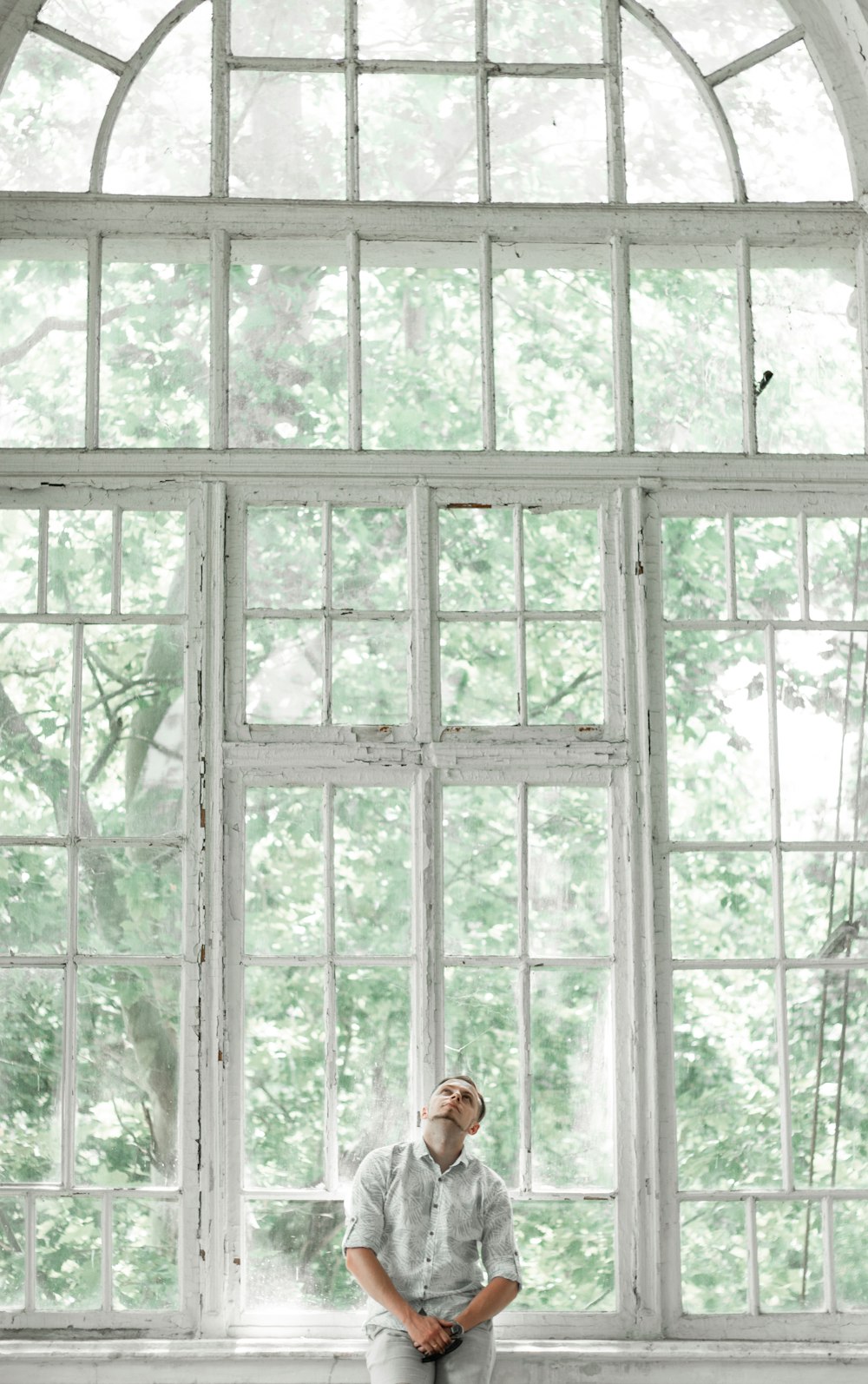 white wooden framed glass window