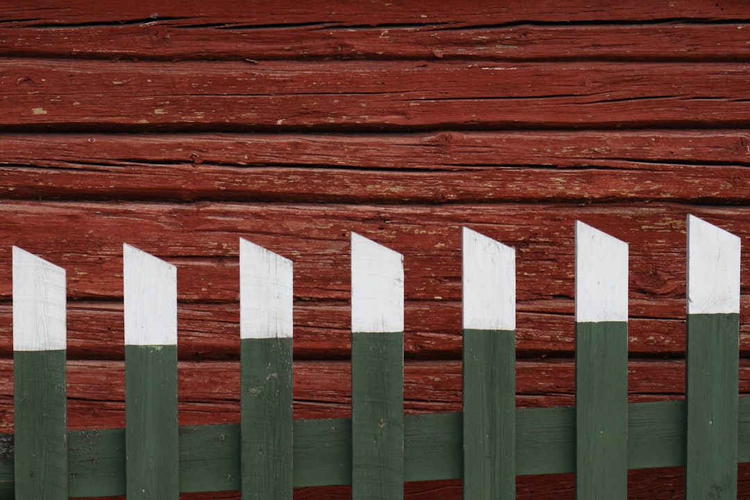 white and red wooden fence