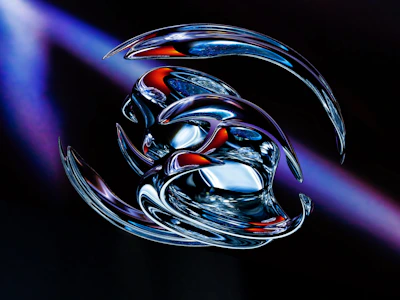 A futuristic and abstract digital artwork featuring intertwined metallic shapes with a glossy finish. The central focus is on smooth, reflective surfaces that merge together, displaying bursts of blue, red, and silver hues. The background is dark, with hints of purple light adding depth and contrast.