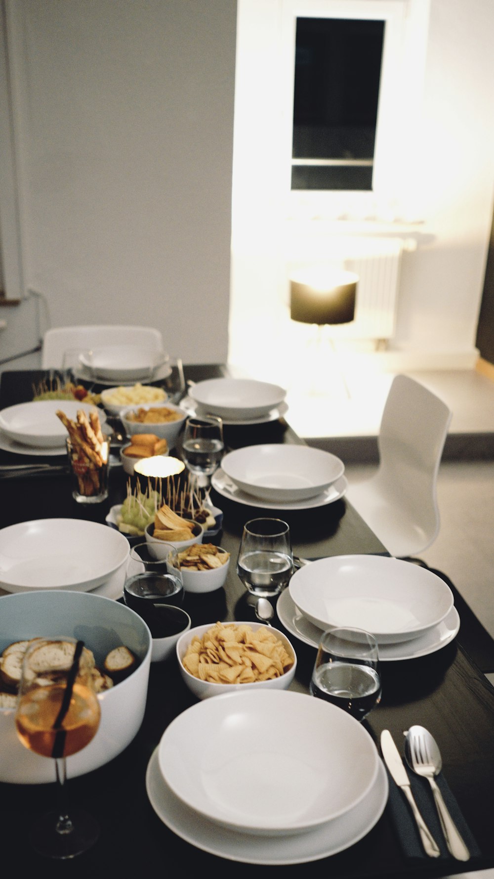 white ceramic plates on table