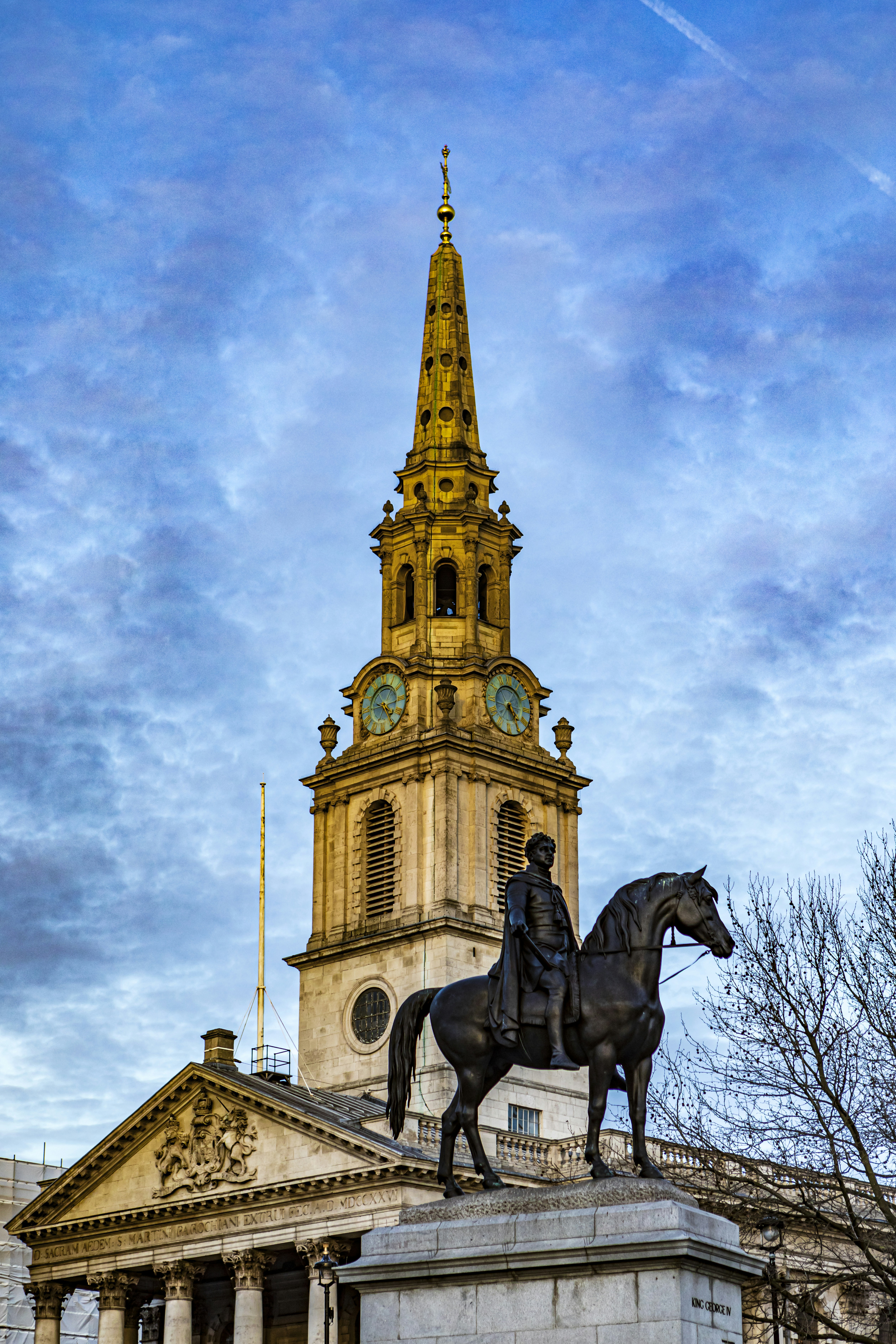 black horse statue under blue sky during daytime