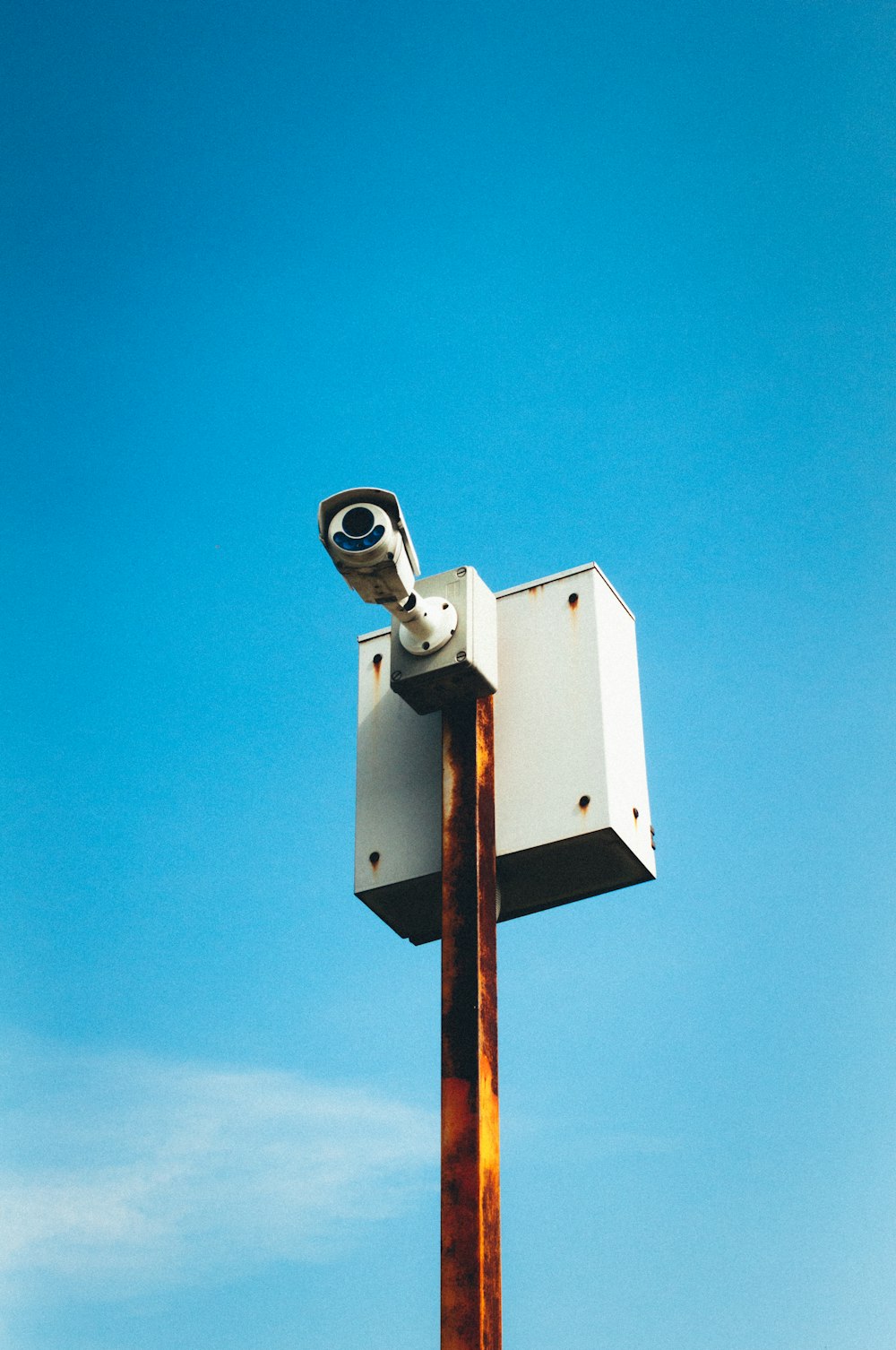 white and brown wooden post