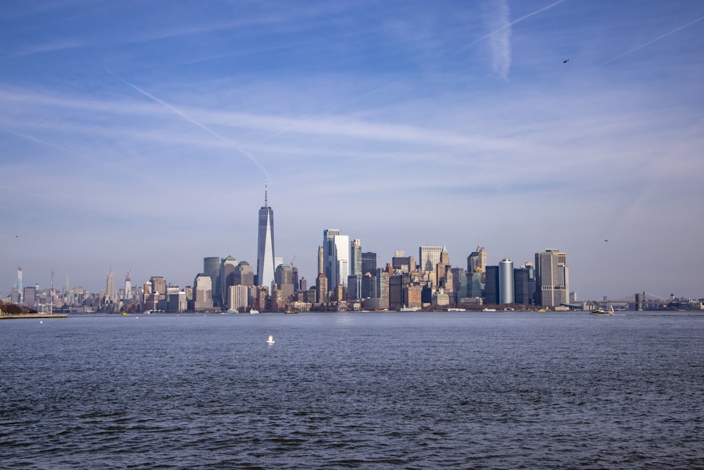 city skyline under blue sky during daytime