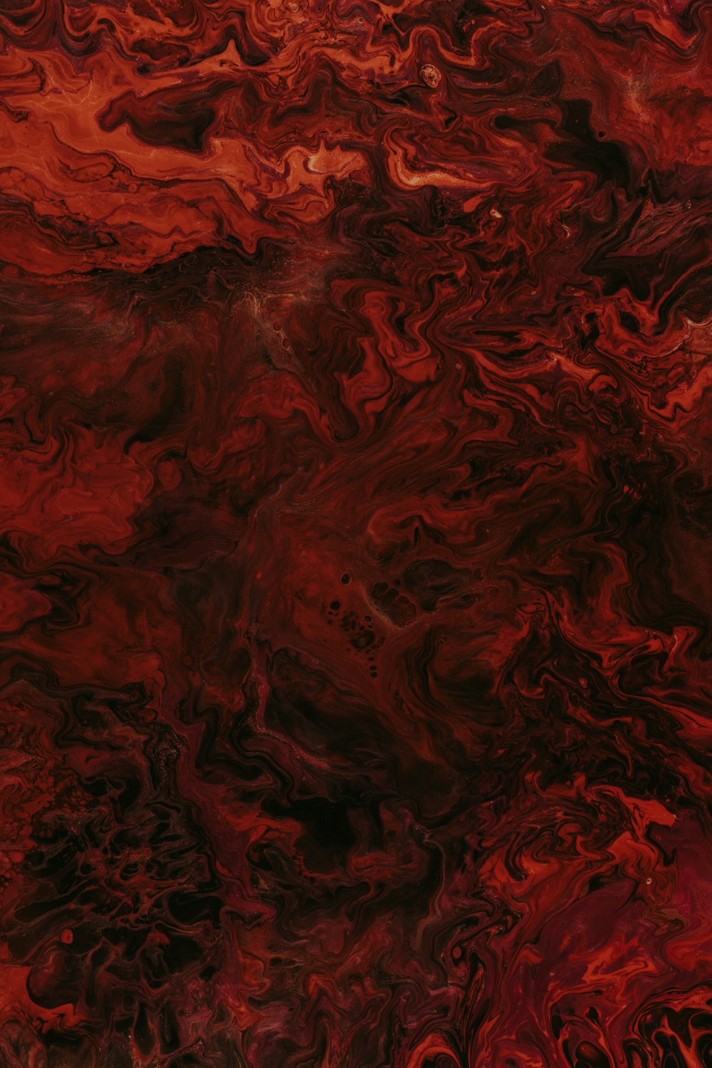 Rote und schwarze abstrakte Malerei