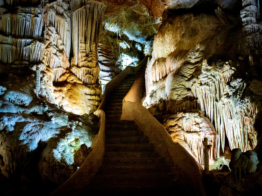 brown rock formation with water falls