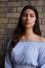 woman in blue off shoulder shirt