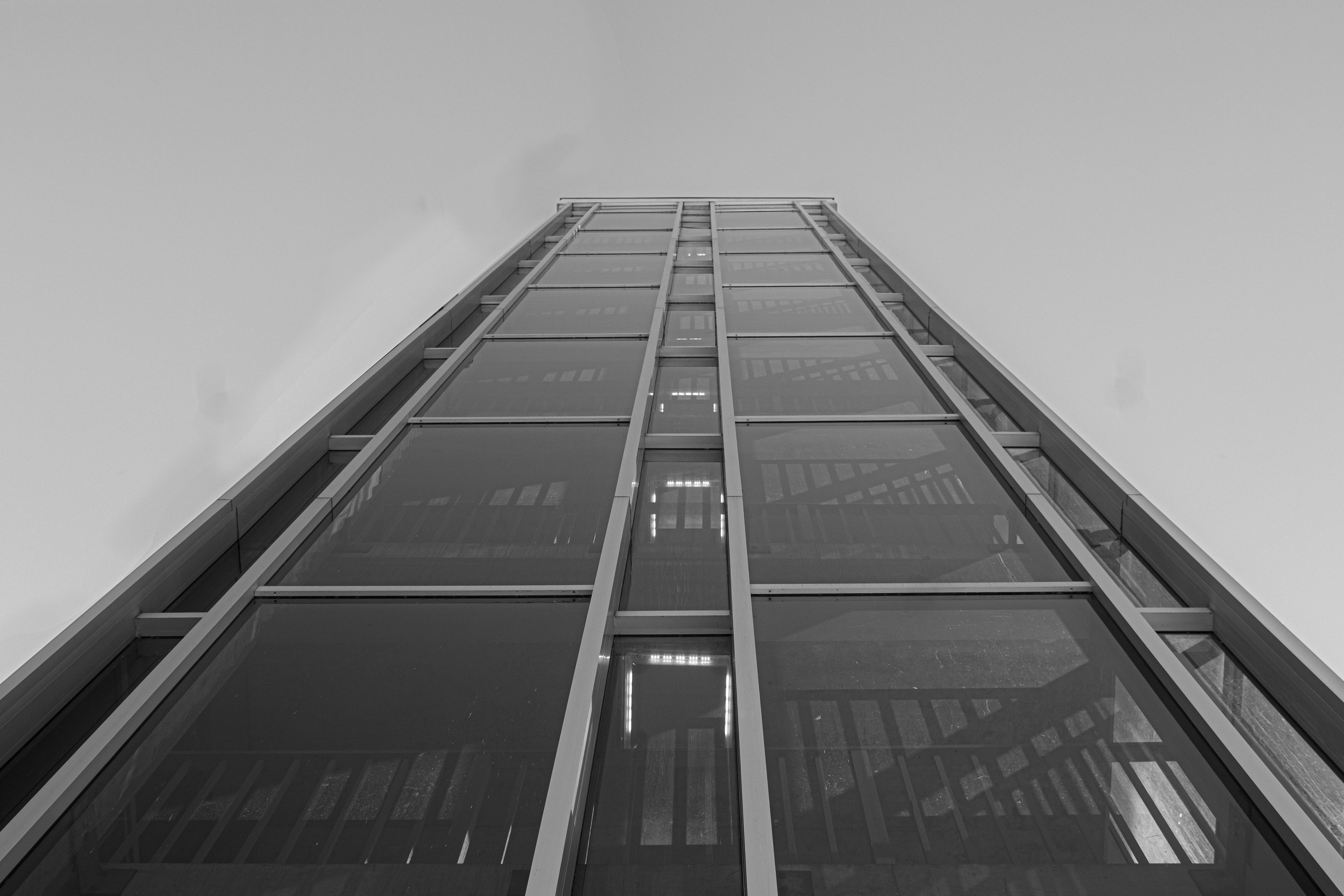 grayscale photo of high rise building