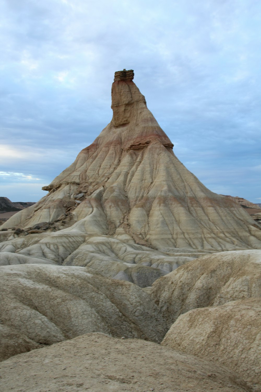 brown rock formation under blue sky during daytime