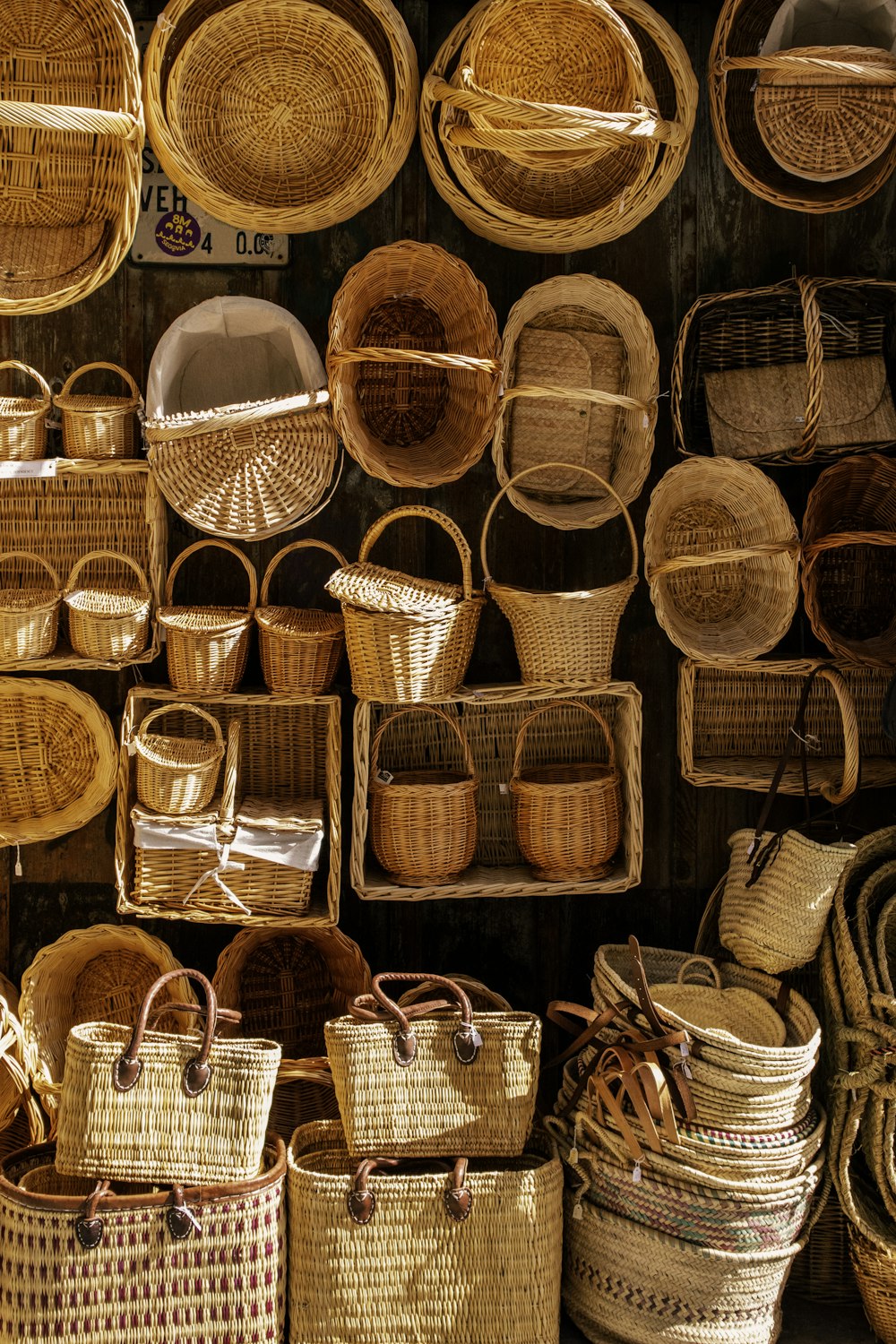 brown woven baskets on white table