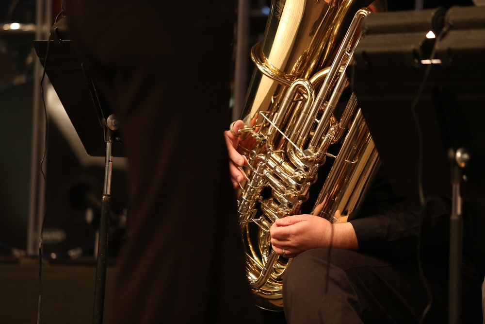 gold trumpet on black textile