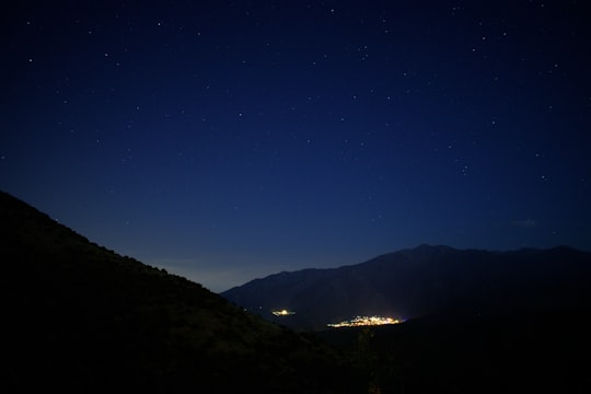 silhouette of mountain under blue sky during night time in Pic du Canigou France