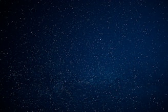 blue sky with stars during night time
