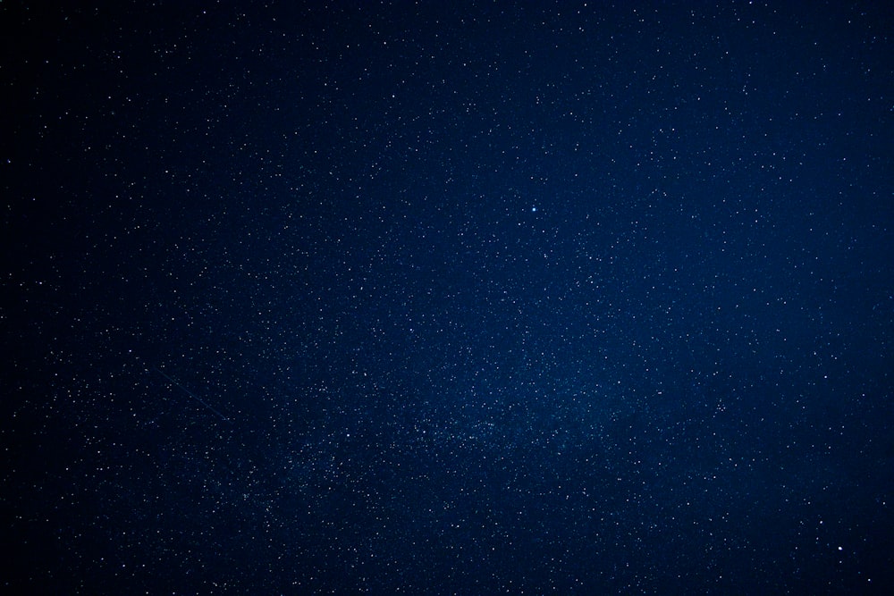 blue sky with stars during night time