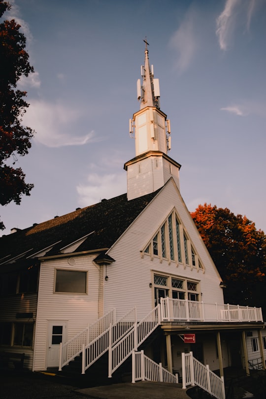 white and black concrete church in Cantons-de-l'Est Canada