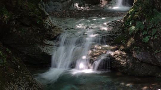 water falls in the middle of rocky mountain in Kinugawa Onsen Japan