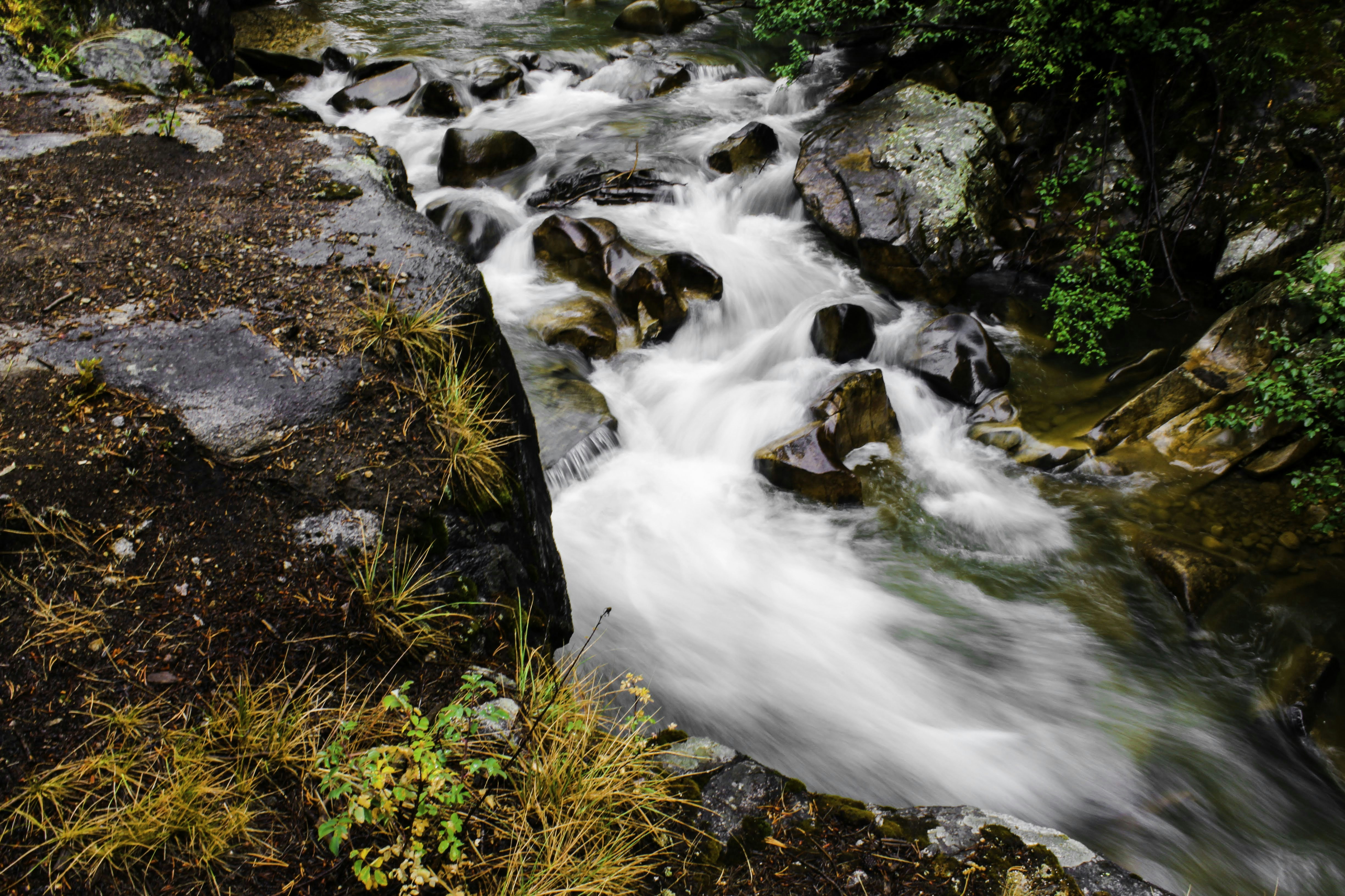 water falls on rocky river