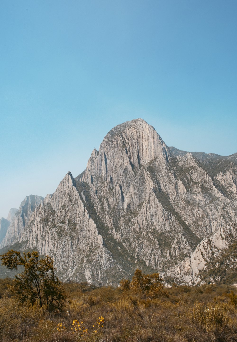 brown and gray mountain under blue sky during daytime