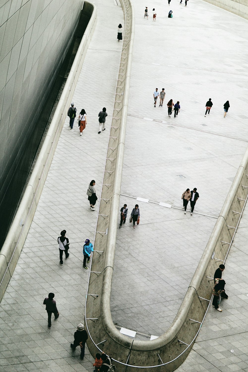 people walking on ice field during daytime