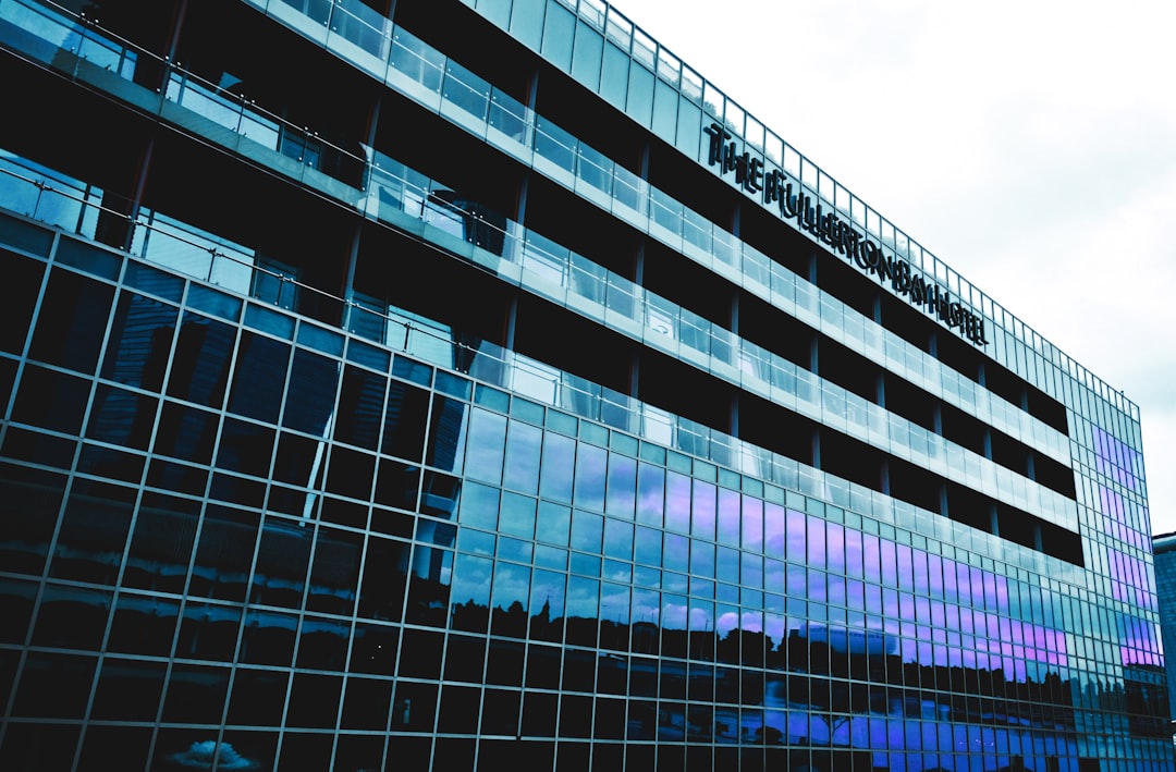 blue and white glass walled building