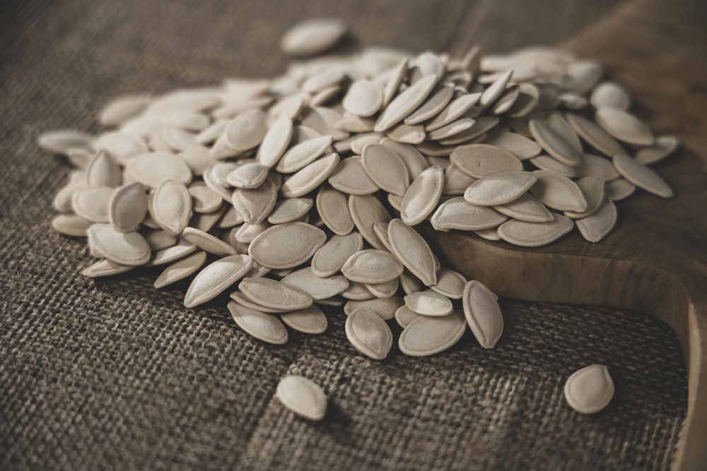 brown seeds on brown wooden surface