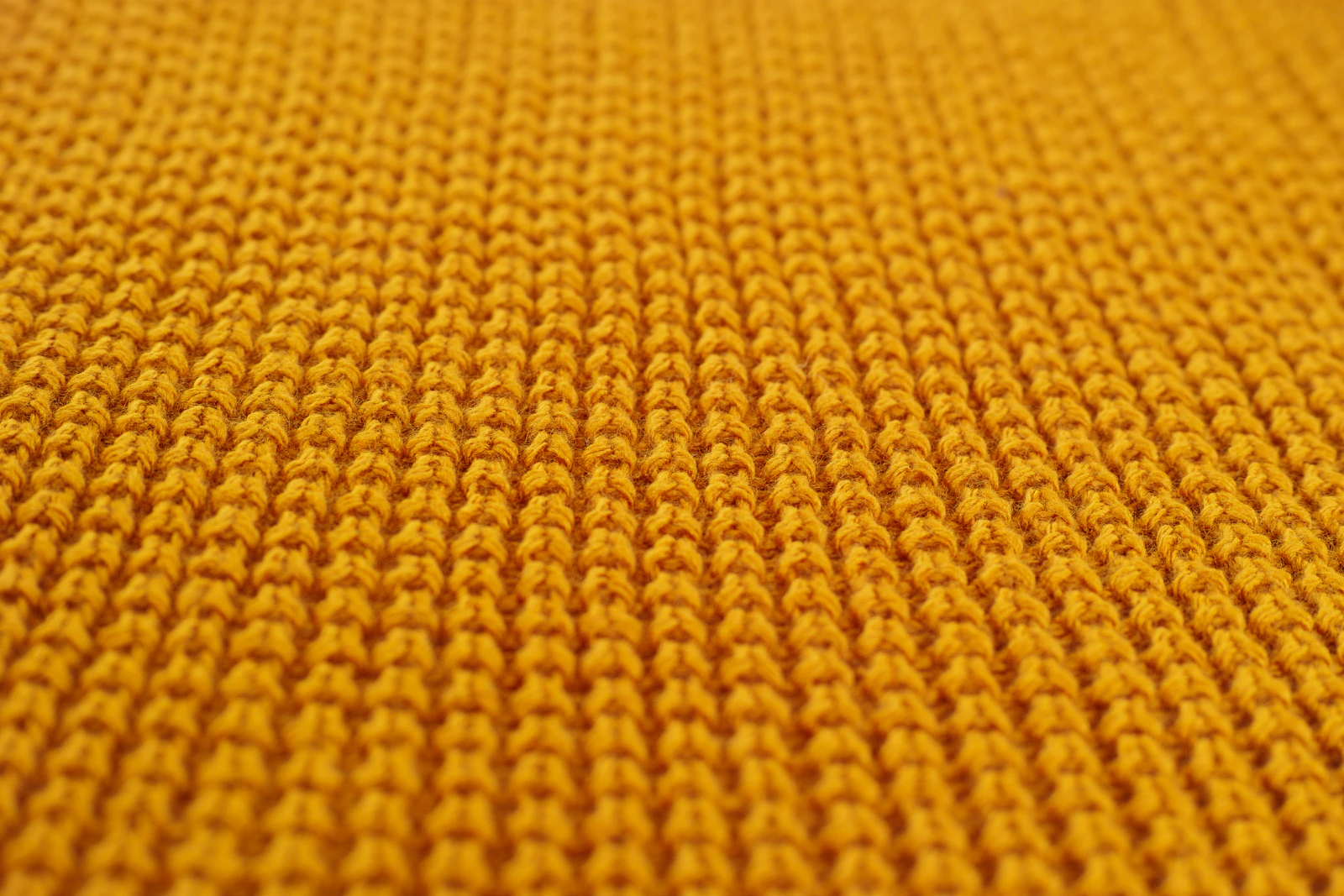 Close-up of piqué knit polo fabric texture