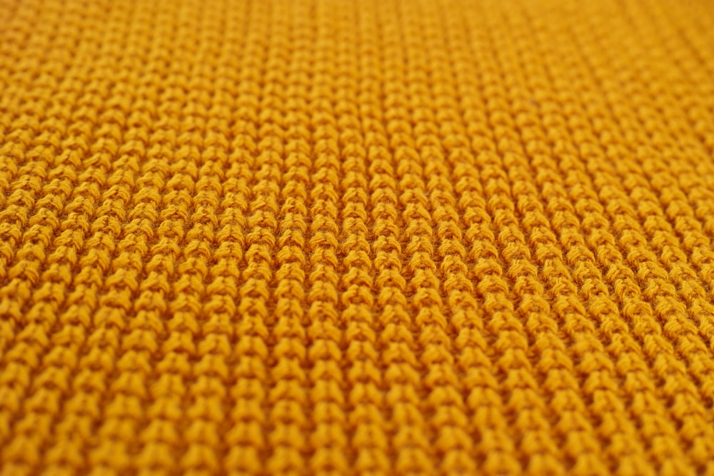 yellow textile in close up photography