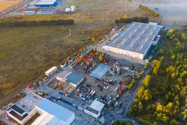 Aerial view of a well-planned industrial road access in Brazil surrounded by greenery.