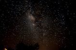 Night sky filled with stars, photographed with a mobile device.