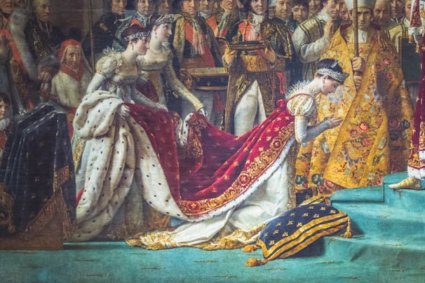 An elegant ceremonial gathering of the Noble Order members dressed in traditional regalia beneath a grand fleur de lis banner.