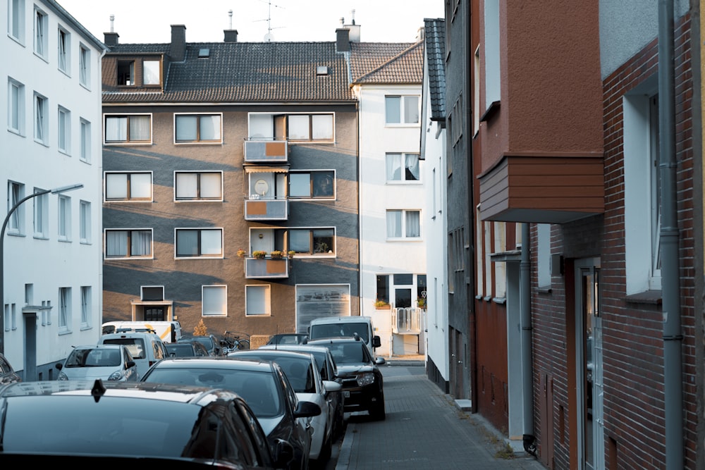 cars parked beside the road during daytime