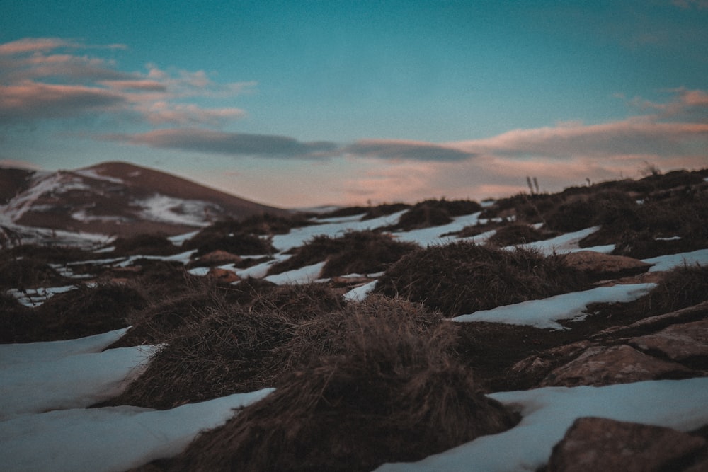 snow covered mountain during daytime