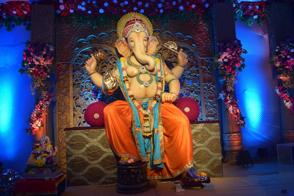 hindu deity figurine on black table