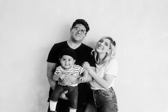 black and white photo of family photographer in Naples florida