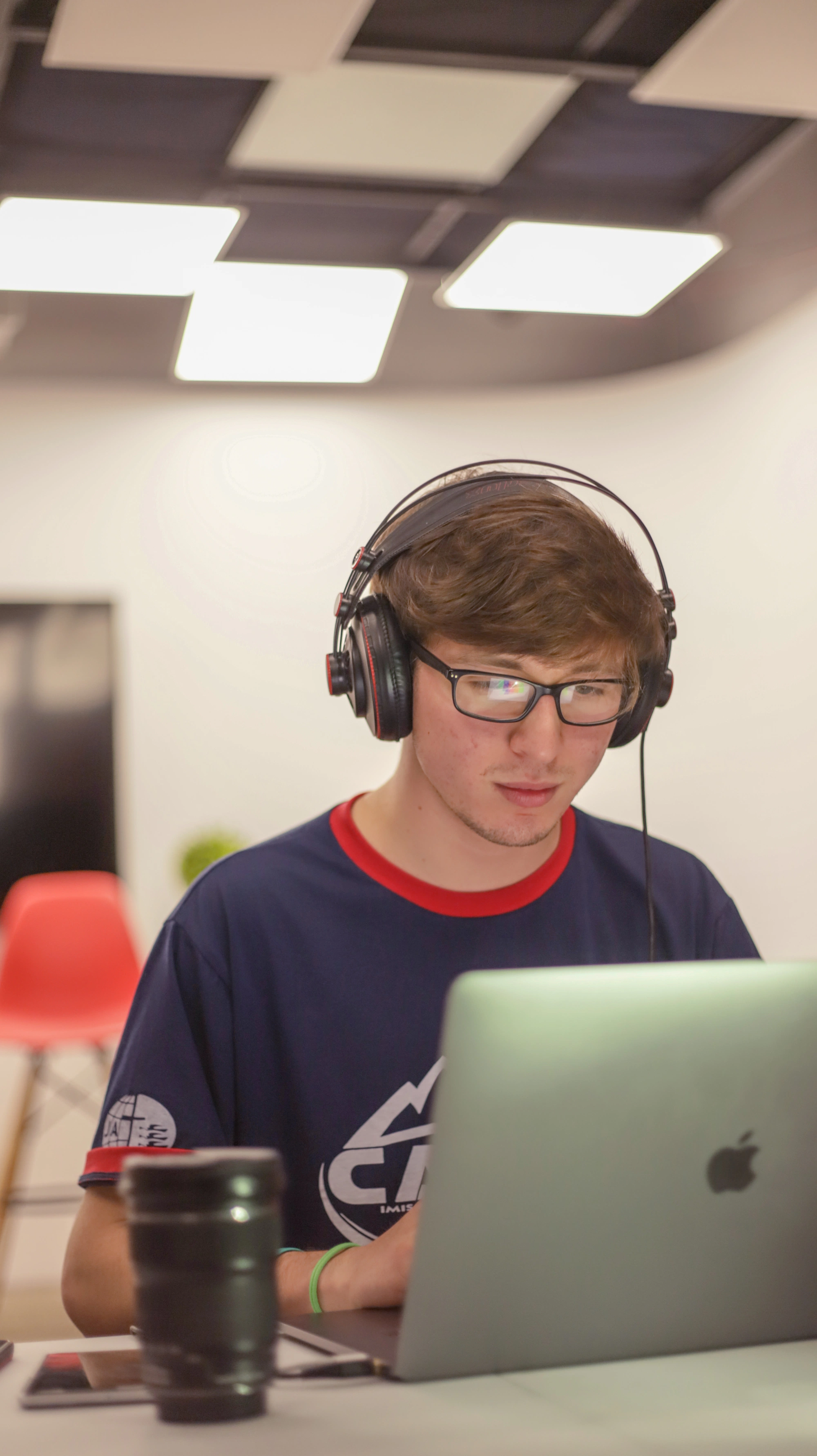 A student working at his laptop