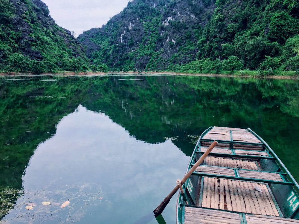 brown wooden dock on lake during daytime