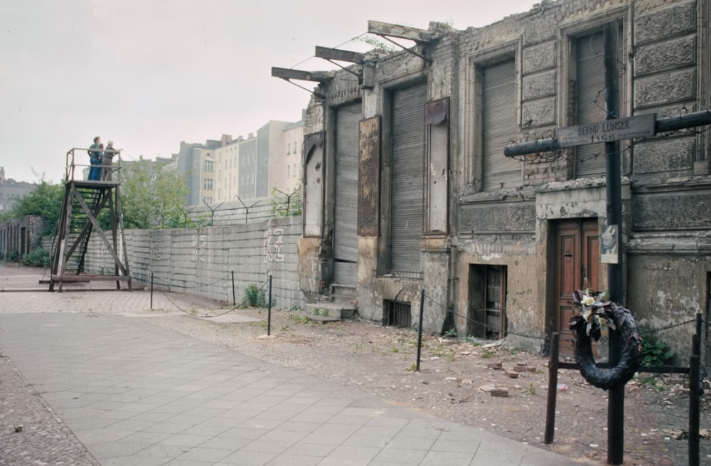 brown wooden doors on gray concrete building during daytime