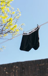 black and white shorts hanging on clothes line
