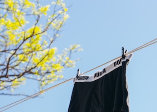 black and white shorts hanging on clothes line