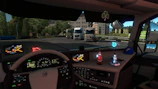 A driver in uniform checking the dashboard of a high-tech transport truck at dawn.
