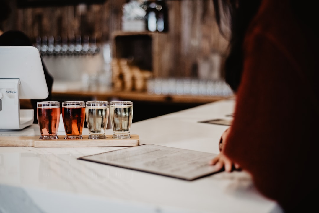 person writing on white paper, Fall drinks- cider