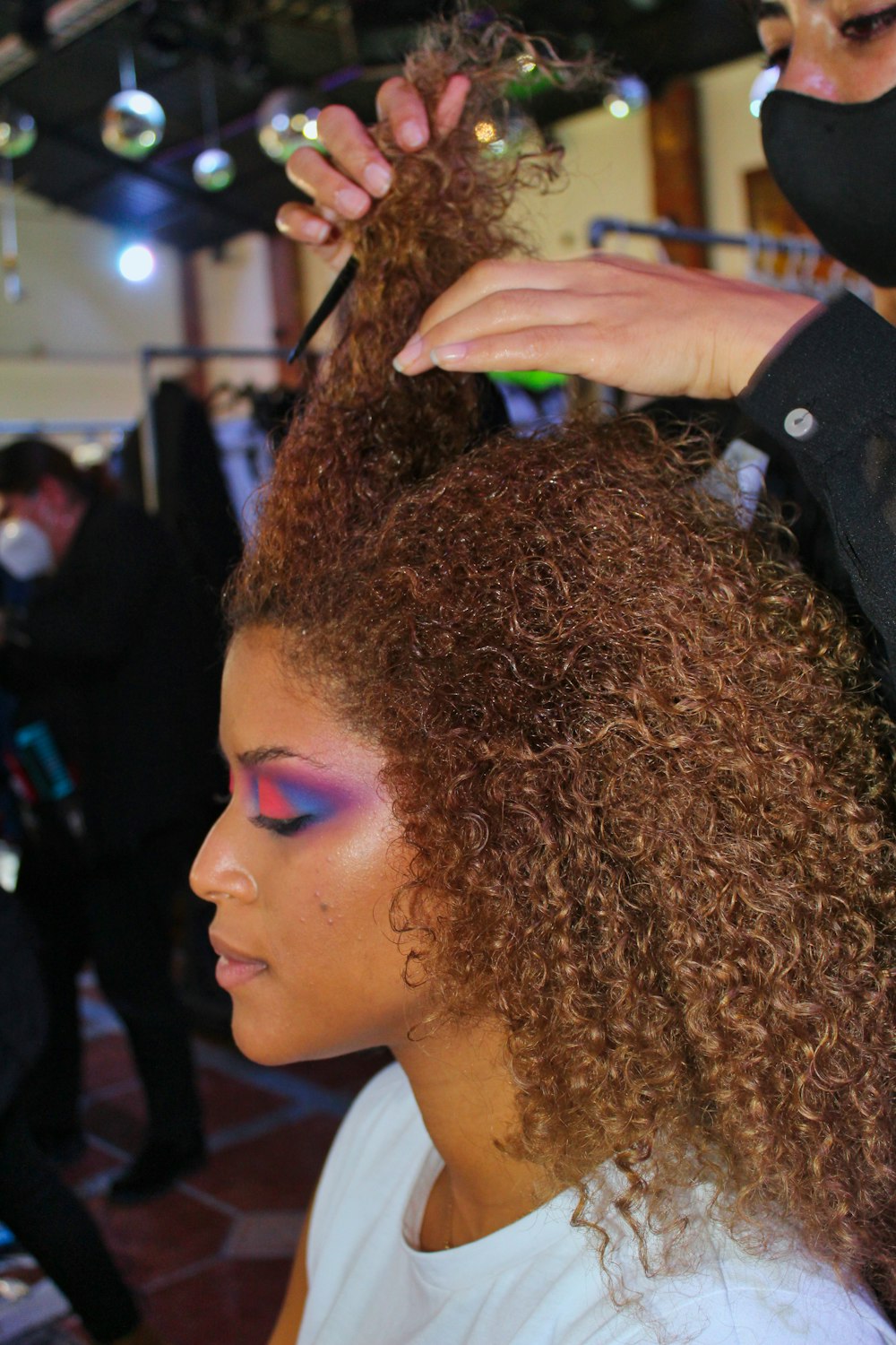 woman with brown curly hair